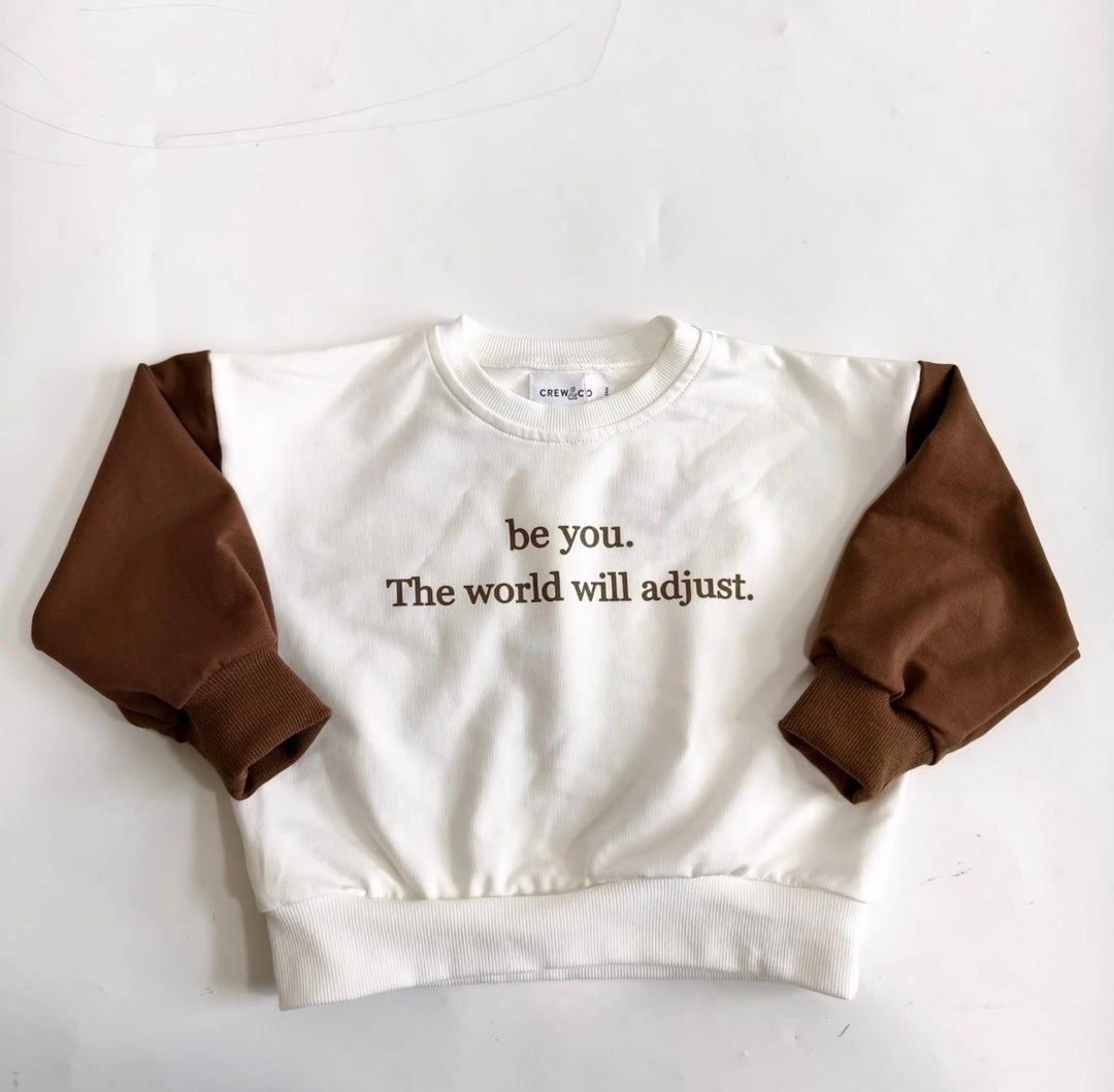 “Be you. The world will adjust” crewneck
